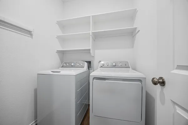 a view of an empty walk in closet