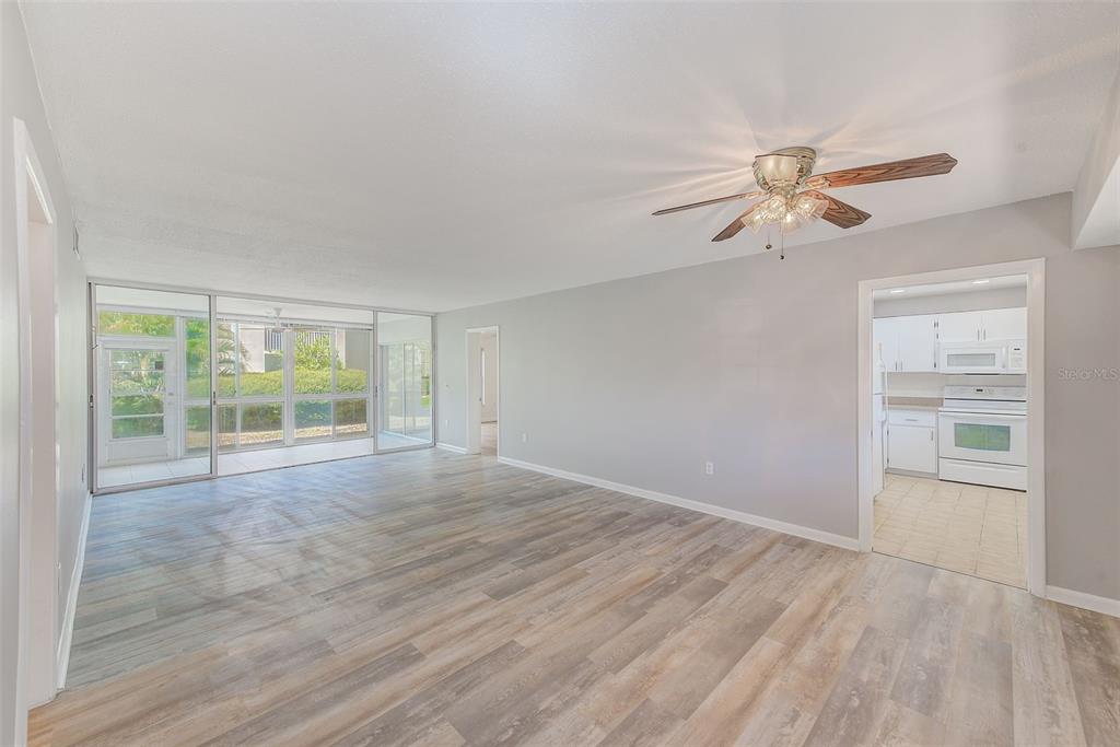 10280 Imperial Point Drive West, Unit 7 Largo, FL 33774 - Photo 20 of 67 a view of an empty room with a window