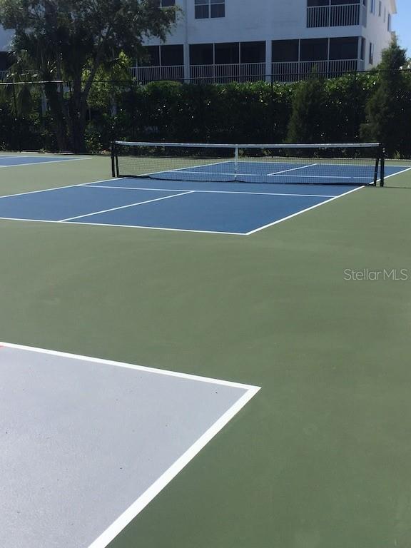 10280 Imperial Point Drive West, Unit 7 Largo, FL 33774 - Photo 47 of 67 a view of a tennis court