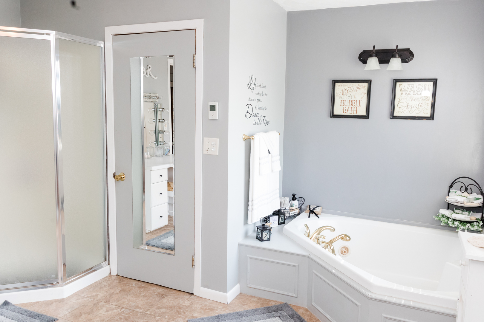 9768 Burns Road Fenton, IL 61251 - Photo 15 of 24 a bathroom with a tub a window and a shower
