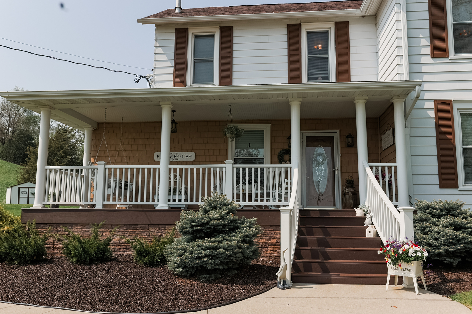 9768 Burns Road Fenton, IL 61251 - Photo 3 of 24 a view of a house with staircase and porch