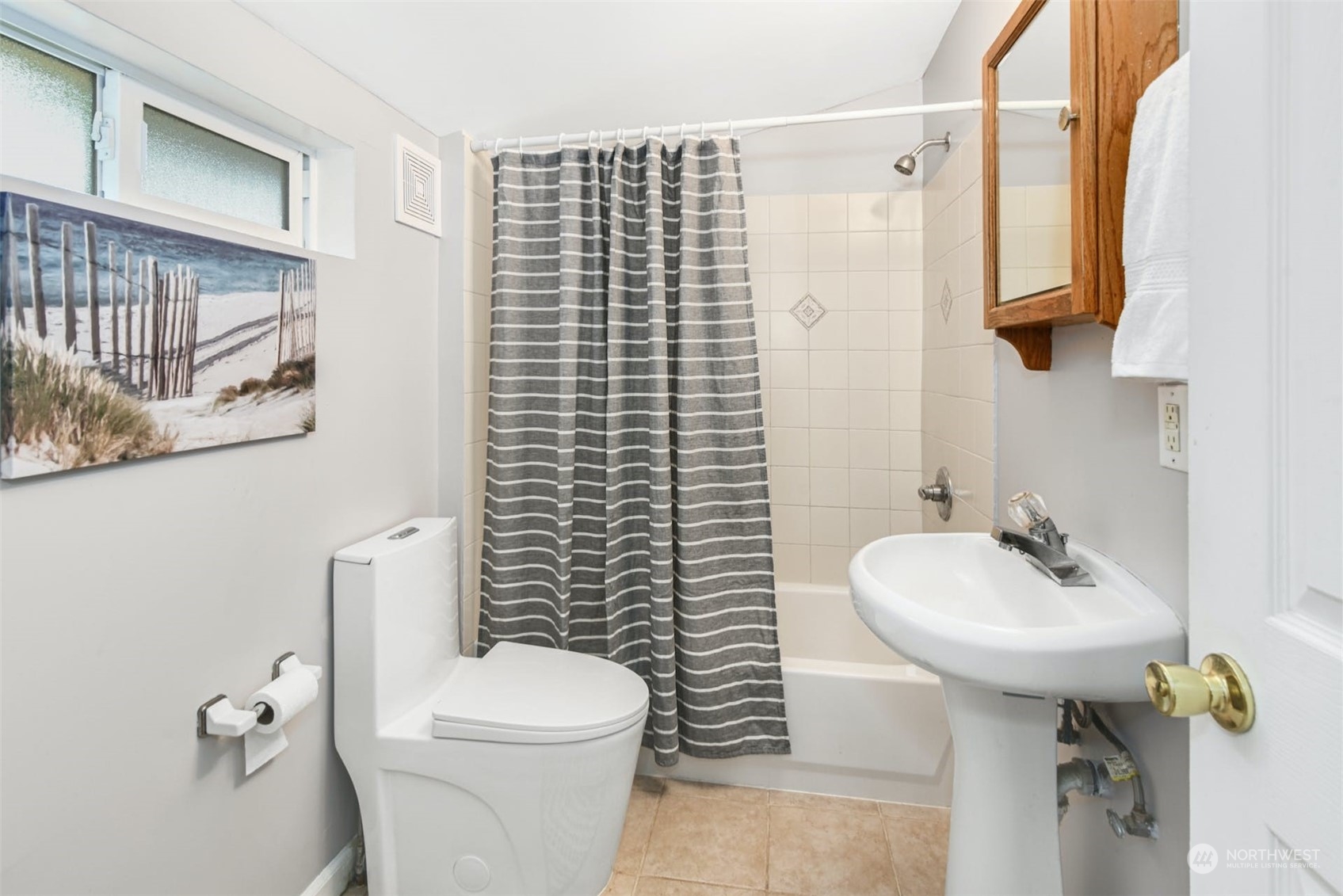 469 Maple Avenue Southwest Renton, WA 98057 - Photo 19 of 30 a bathroom with a sink toilet and mirror