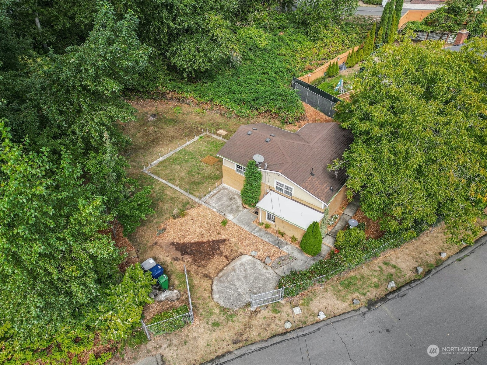 469 Maple Avenue Southwest Renton, WA 98057 - Photo 23 of 30 an aerial view of a house with a yard and greenery