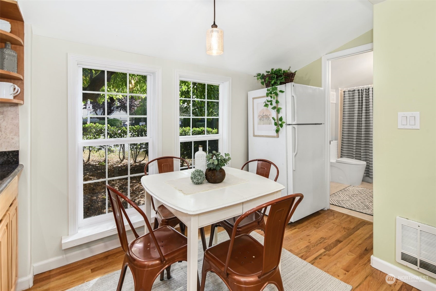 469 Maple Avenue Southwest Renton, WA 98057 - Photo 10 of 30 a view of a dining room with furniture and window