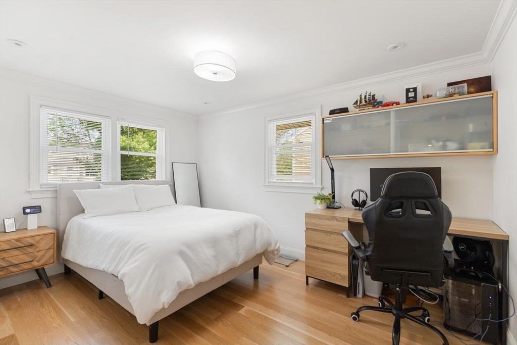 155 Adams Avenue Newton, MA 02465 - Photo 18 of 37 a bedroom with a bed and a furniture