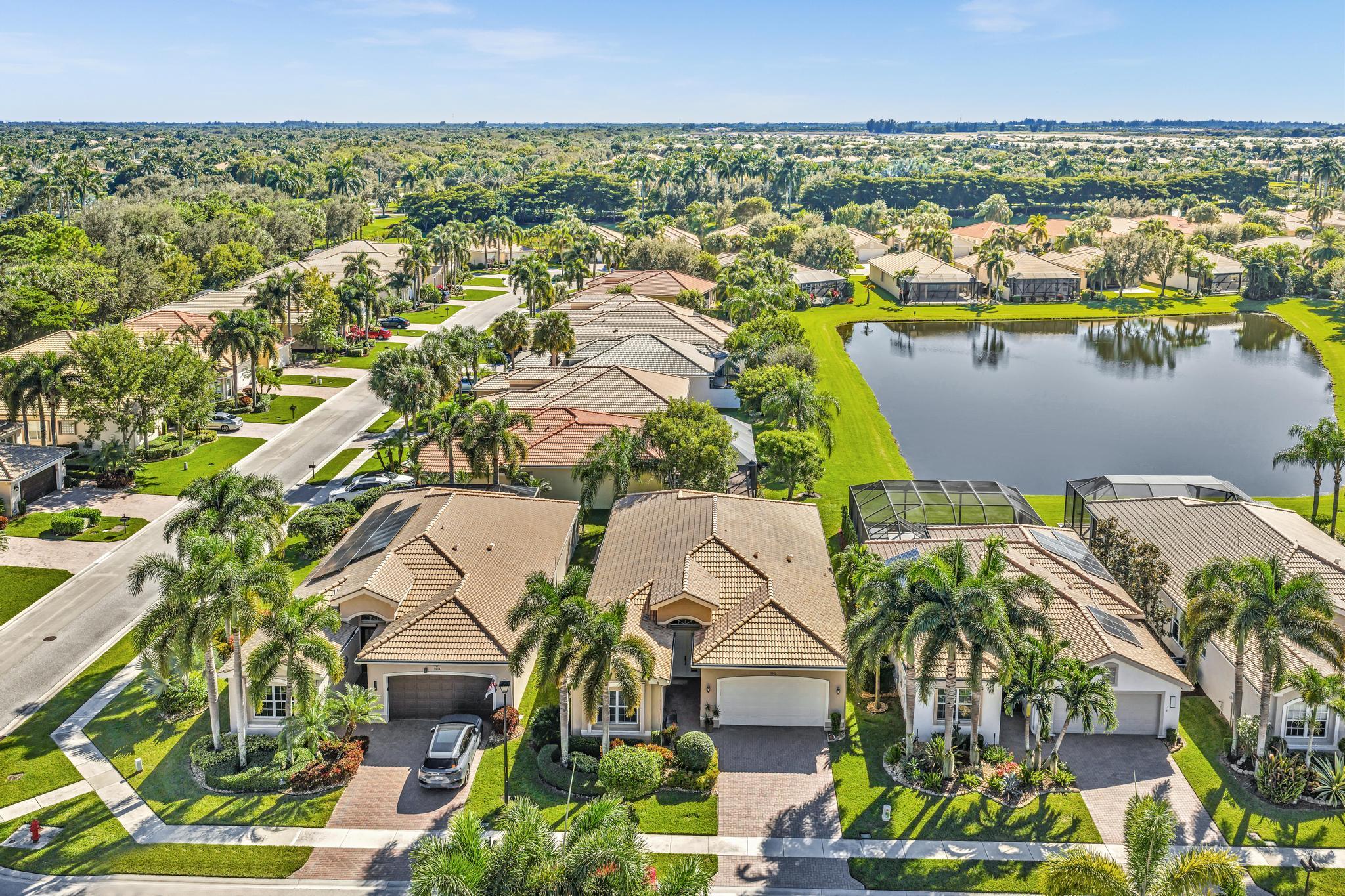 9062 Meridian View Isle Boynton Beach, FL 33473 - Photo 58 of 71 an aerial view of residential houses with outdoor space and swimming pool