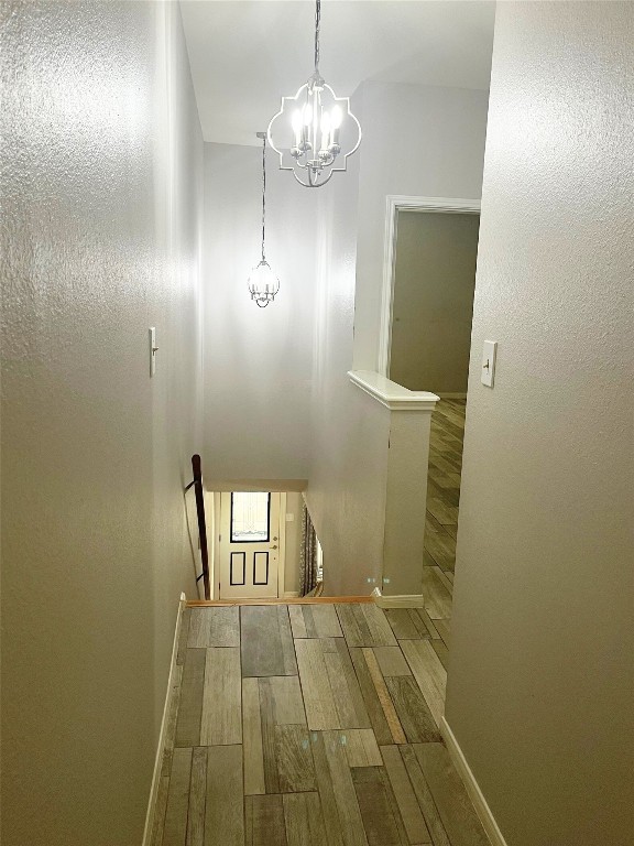4001 Tanglewilde Street, Unit 1203 Houston, TX 77063 - Photo 5 of 14 a view of a room with wooden floor and staircase