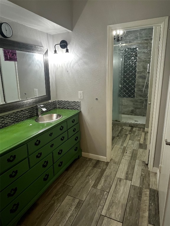 4001 Tanglewilde Street, Unit 1203 Houston, TX 77063 - Photo 7 of 14 a bathroom with a mirror and a sink