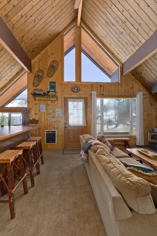 a kitchen with stainless steel appliances a stove a refrigerator and cabinets