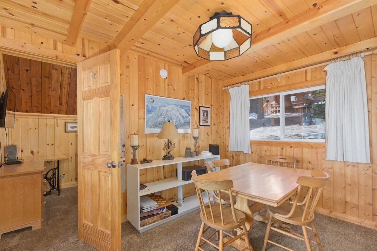 11000 Minaret Road, Unit 2 Mammoth Lakes, CA 93546 - Photo 20 of 31 a dining room with furniture and window