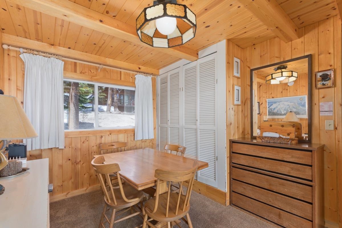 11000 Minaret Road, Unit 2 Mammoth Lakes, CA 93546 - Photo 21 of 31 a view of a dining room with furniture window and outside view
