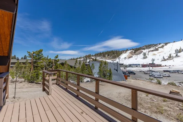 a view of a bathroom with a sink and a mirror