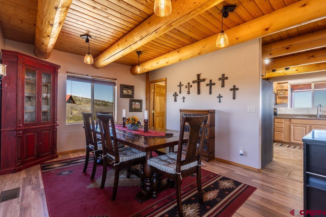 1737 Roberts Ridge Drive Hesperus, CO 81326 - Photo 7 of 34 a view of a dining room with furniture and chandelier