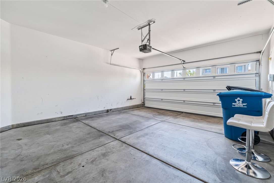 5510 Ripple Ridge Avenue Las Vegas, NV 89139 - Photo 44 of 45 This spacious garage offers practical utility and ample storage potential.
