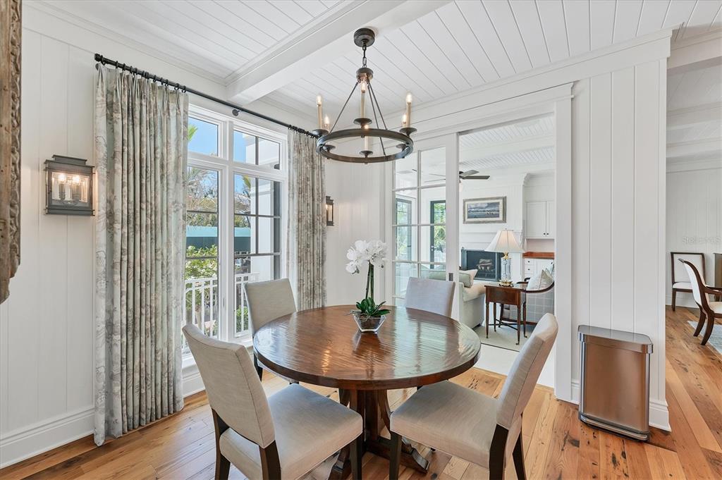 150 1st Street East Boca Grande, FL 33921 - Photo 17 of 72 a view of a dining room with furniture window and wooden floor