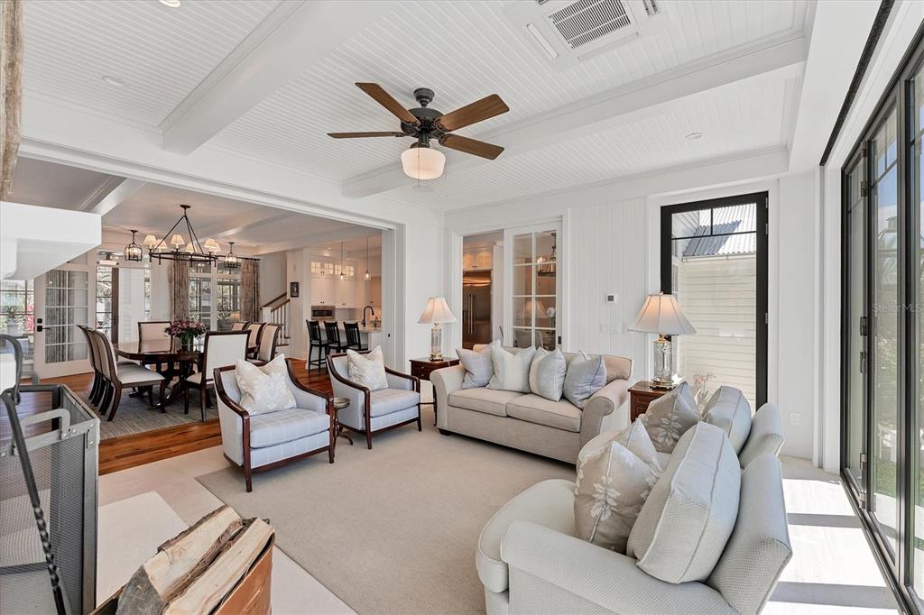 150 1st Street East Boca Grande, FL 33921 - Photo 20 of 72 a living room with furniture and a large window