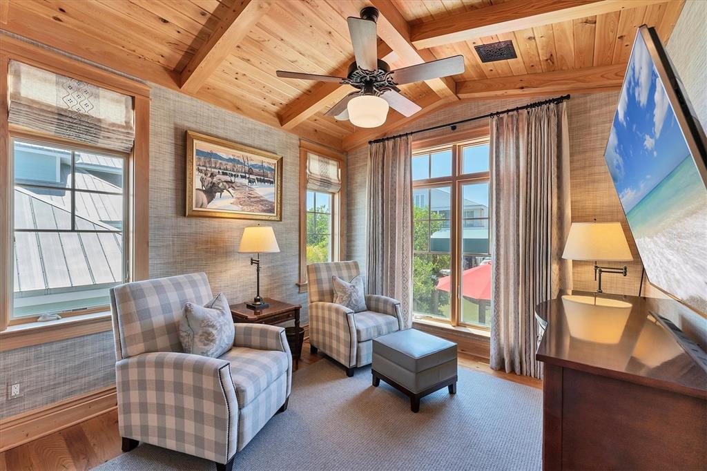 150 1st Street East Boca Grande, FL 33921 - Photo 22 of 72 a living room with furniture and a large window