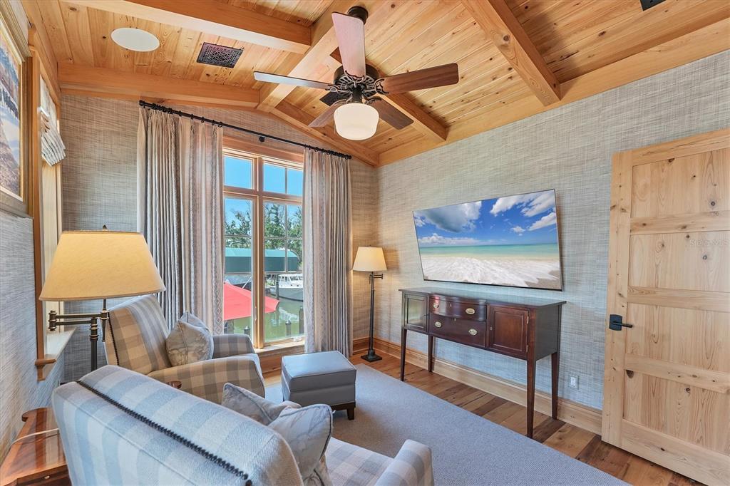150 1st Street East Boca Grande, FL 33921 - Photo 23 of 72 a living room with furniture and a window