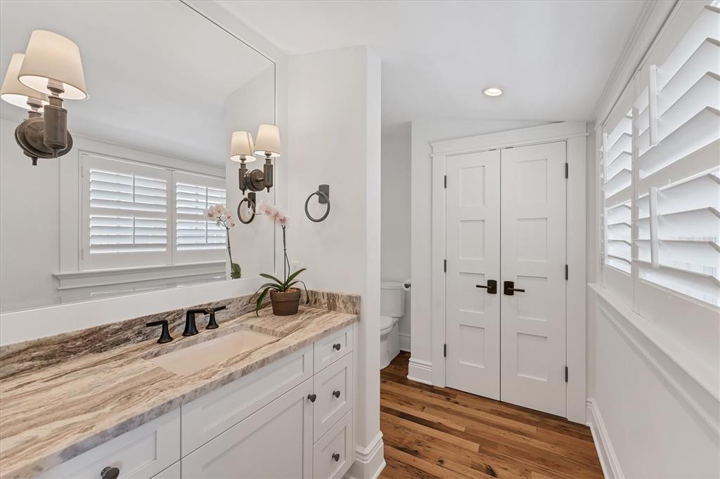 150 1st Street East Boca Grande, FL 33921 - Photo 38 of 72 a bathroom with a sink and a mirror