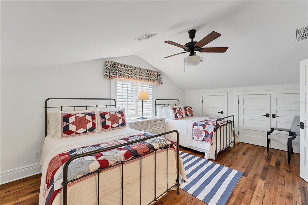 150 1st Street East Boca Grande, FL 33921 - Photo 44 of 72 a bedroom with furniture and a baby crib