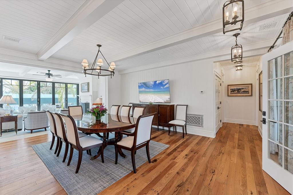 150 1st Street East Boca Grande, FL 33921 - Photo 8 of 72 a view of a dining room with furniture window and wooden floor