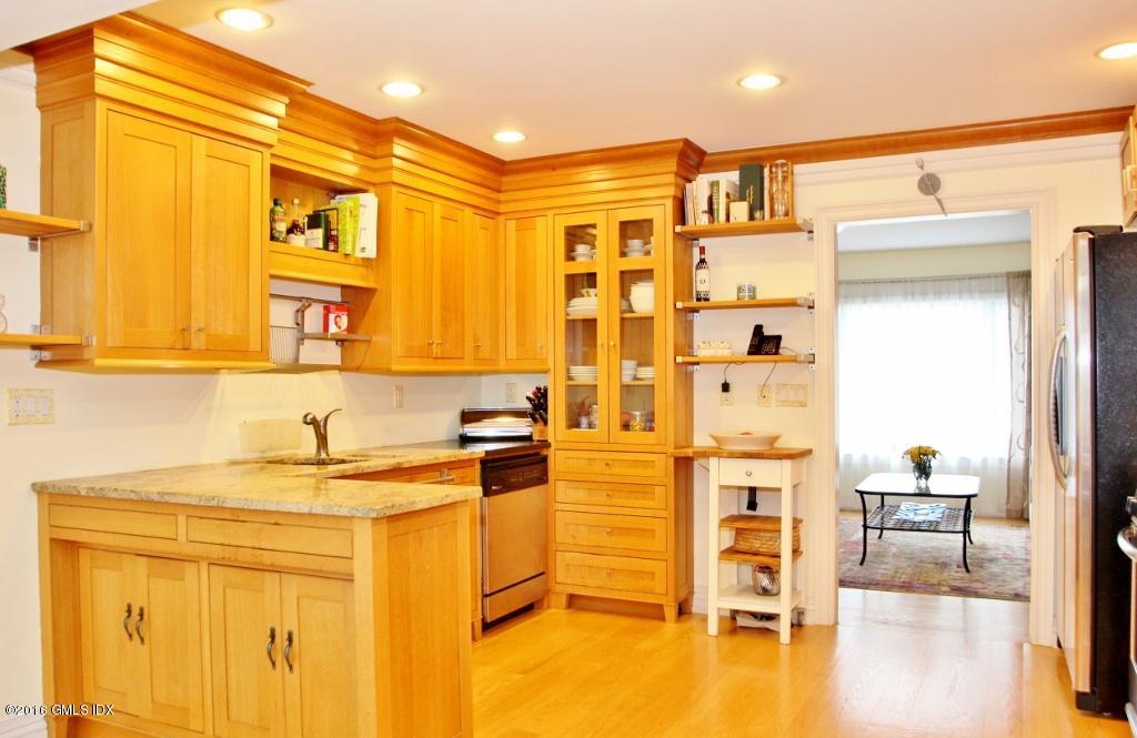 31 Bonwit Road Riverside, CT 06878 - Photo 7 of 31 a bathroom with a sink a mirror and a shower