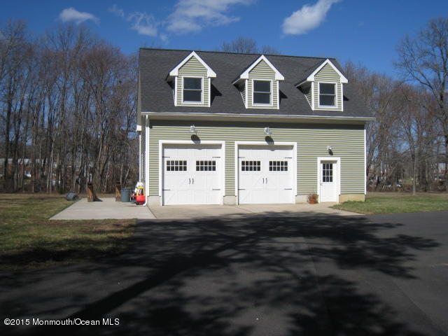 67 Aberdeen Road Matawan, NJ 07747 - Photo 14 of 17 a front view of a house with a yard