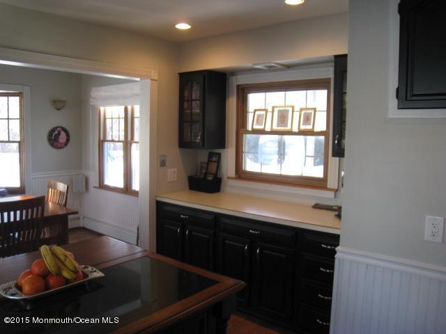 67 Aberdeen Road Matawan, NJ 07747 - Photo 5 of 17 a kitchen with a sink cabinets and window