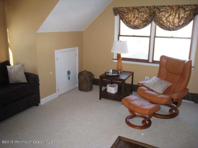 67 Aberdeen Road Matawan, NJ 07747 - Photo 10 of 17 a room with furniture and a window