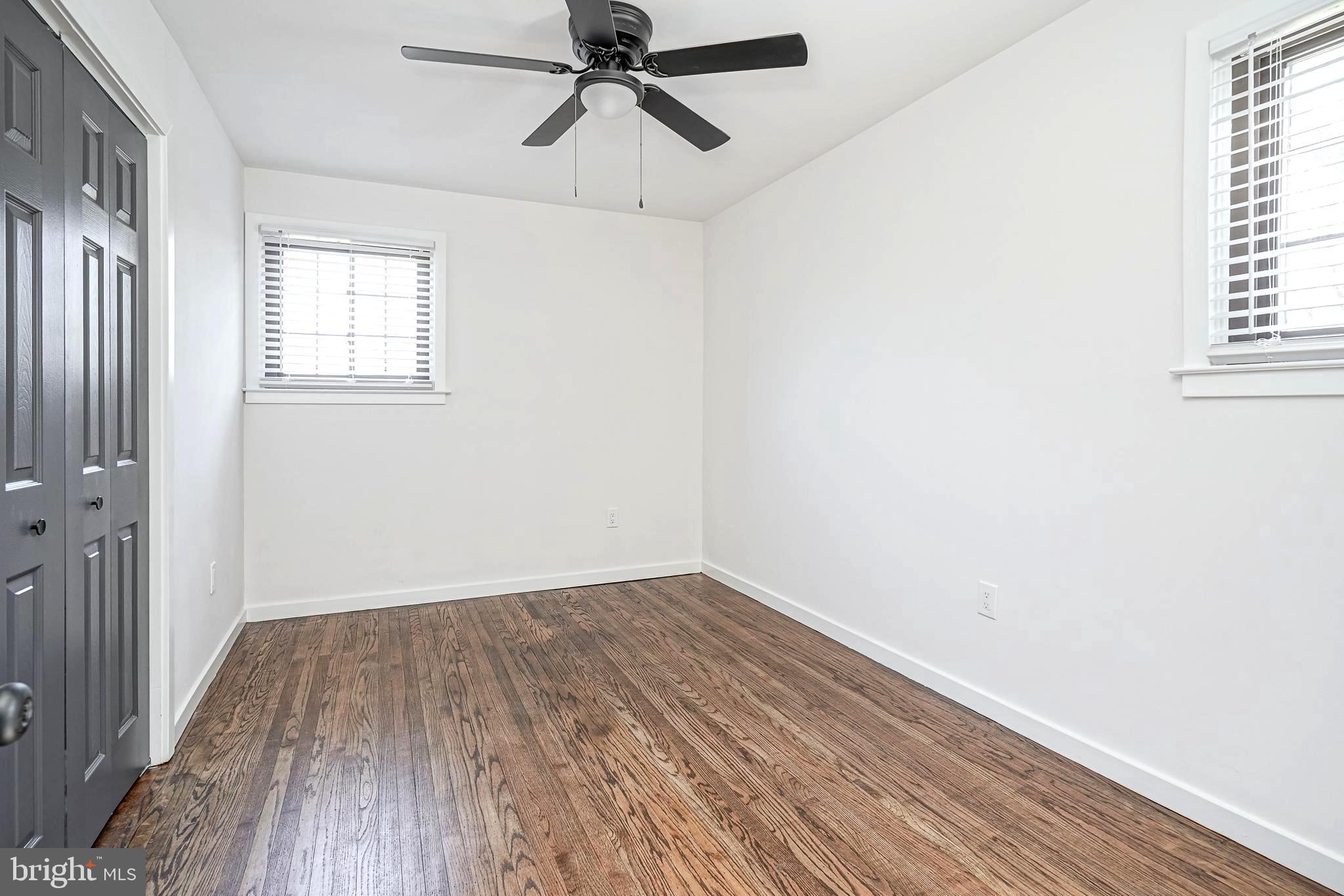 511 Boundary Road Pitman, NJ 08071 - Photo 20 of 36 wooden floor in an empty room with a window