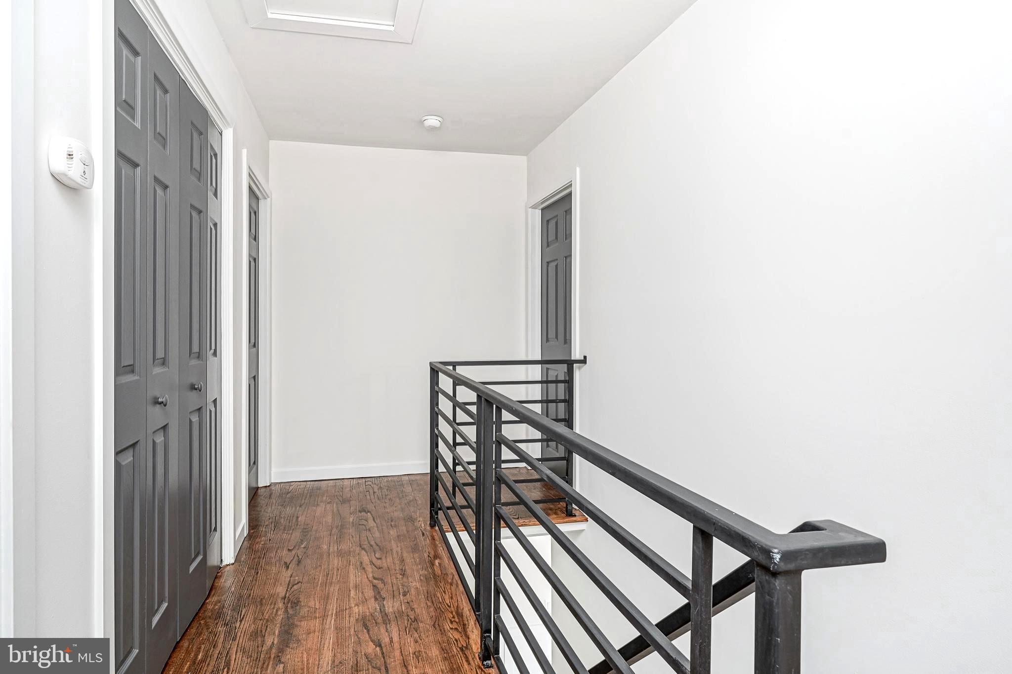 511 Boundary Road Pitman, NJ 08071 - Photo 22 of 36 a view of a hallway with wooden floor
