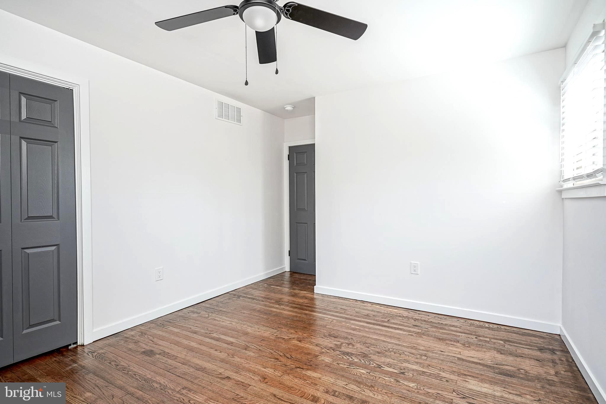 511 Boundary Road Pitman, NJ 08071 - Photo 24 of 36 a view of an empty room with wooden floor