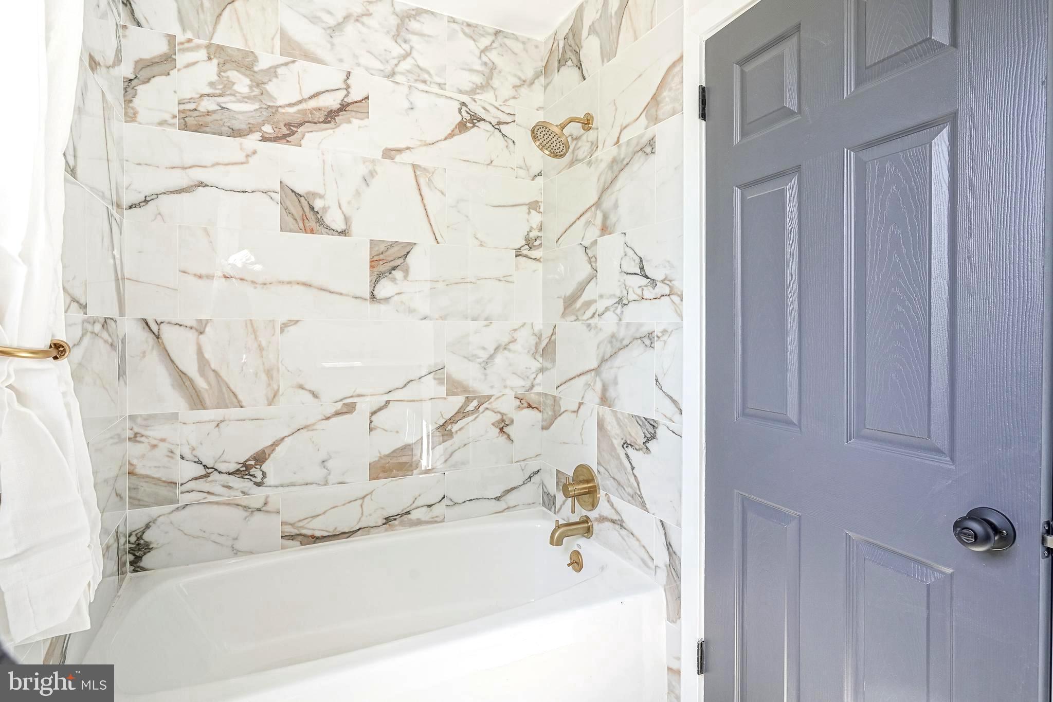 511 Boundary Road Pitman, NJ 08071 - Photo 26 of 36 a bathroom with a bathtub