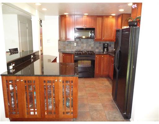 106 Crosswick Road Coraopolis, PA 15108 - Photo 2 of 18 Kitchen. GRANITE COUNTERS, RECESSED LIGHTING,SLATE BACKSPLASH,CUSTOM CHERRY CABINETS, CERAMIC FLOOR! WOW!