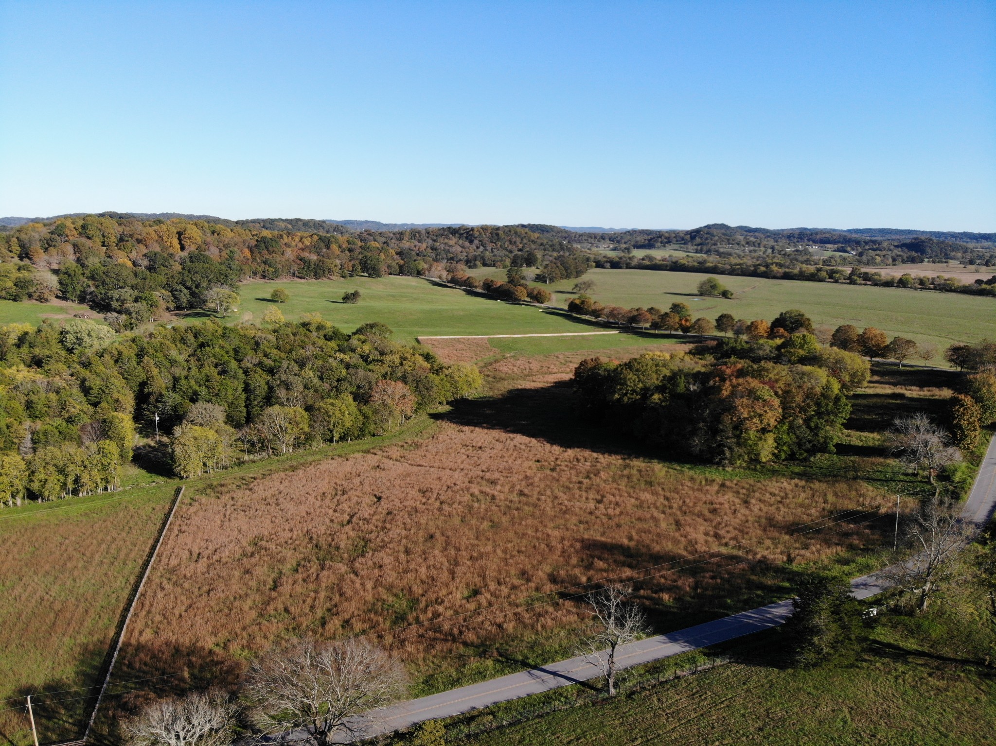 6 Carl Road Franklin, TN 37064 - Photo 18 of 22 a view of a lake with houses in the background