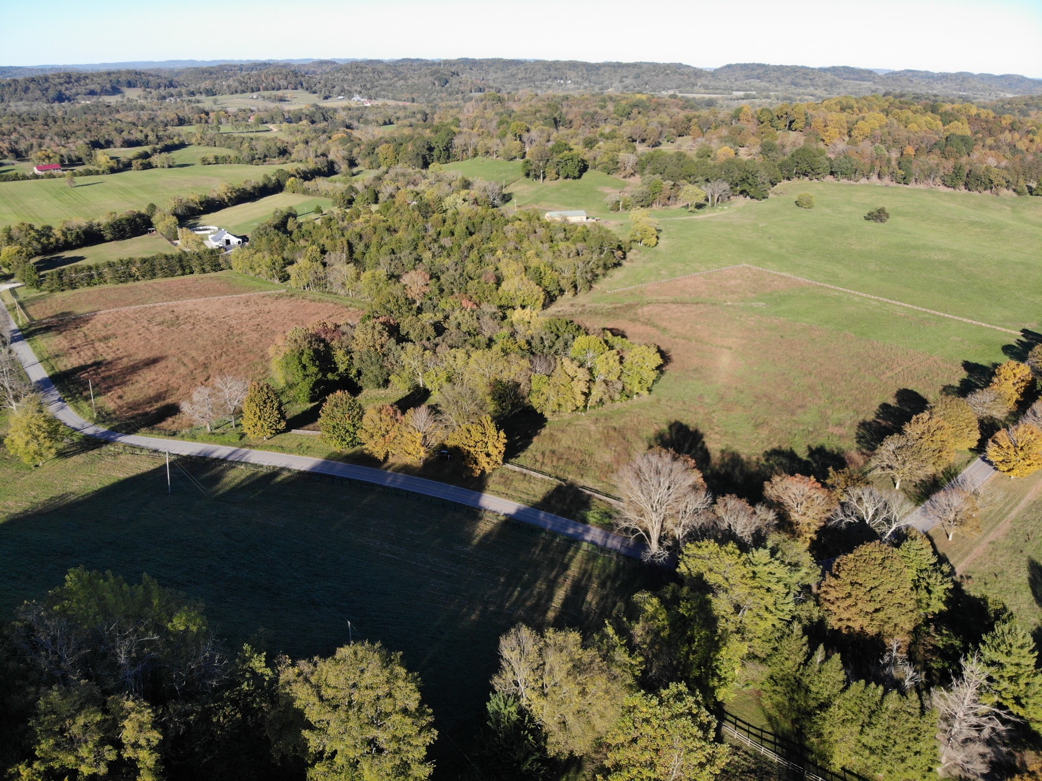 6 Carl Road Franklin, TN 37064 - Photo 22 of 22 a view of a lake with a mountain and a forest