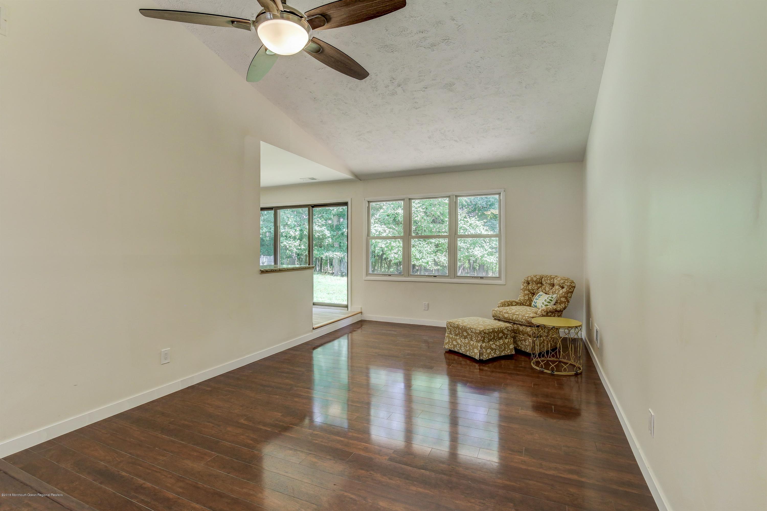 38 Dutch Valley Road Howell, NJ 07731 - Photo 9 of 20 a living room with furniture and a window