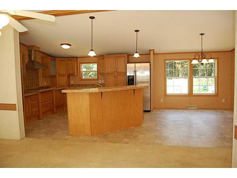 75 Sands Crossing Road Waterboro, ME 04087 - Photo 4 of 13 Exterior Front. Kitchen/Dining area