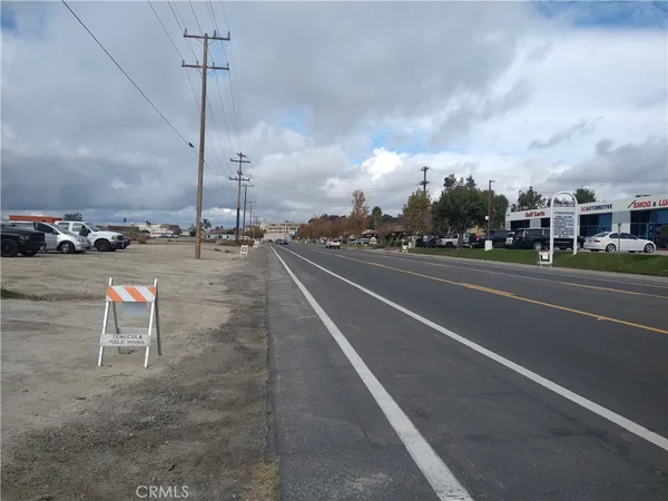 a view of outdoor space with parked cars