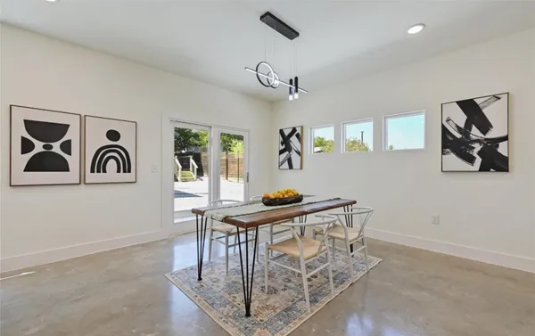 a view of a livingroom with furniture and window