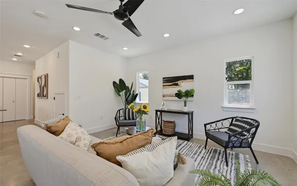 a living room with furniture and a window