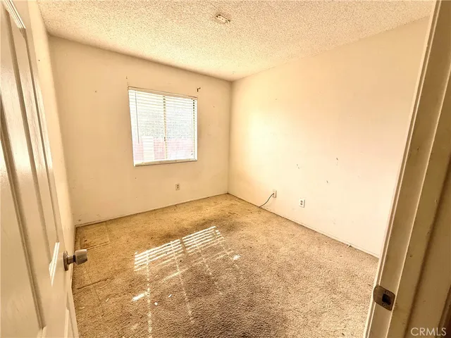 an empty room with a natural light