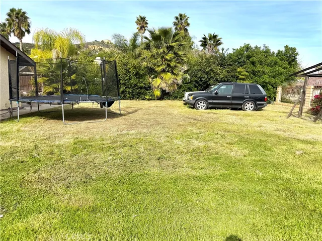 a swimming pool with a yard