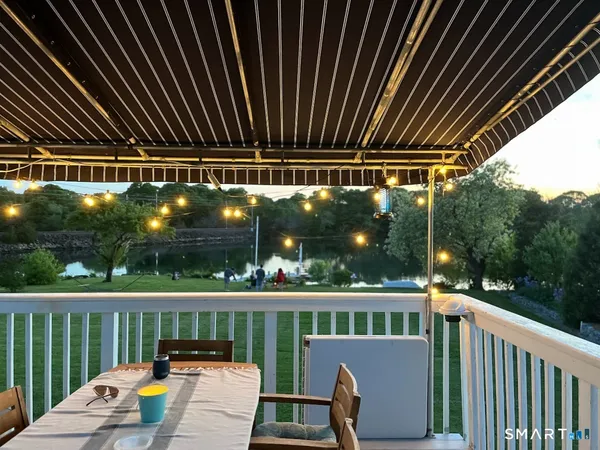 a view of a chairs on the roof deck