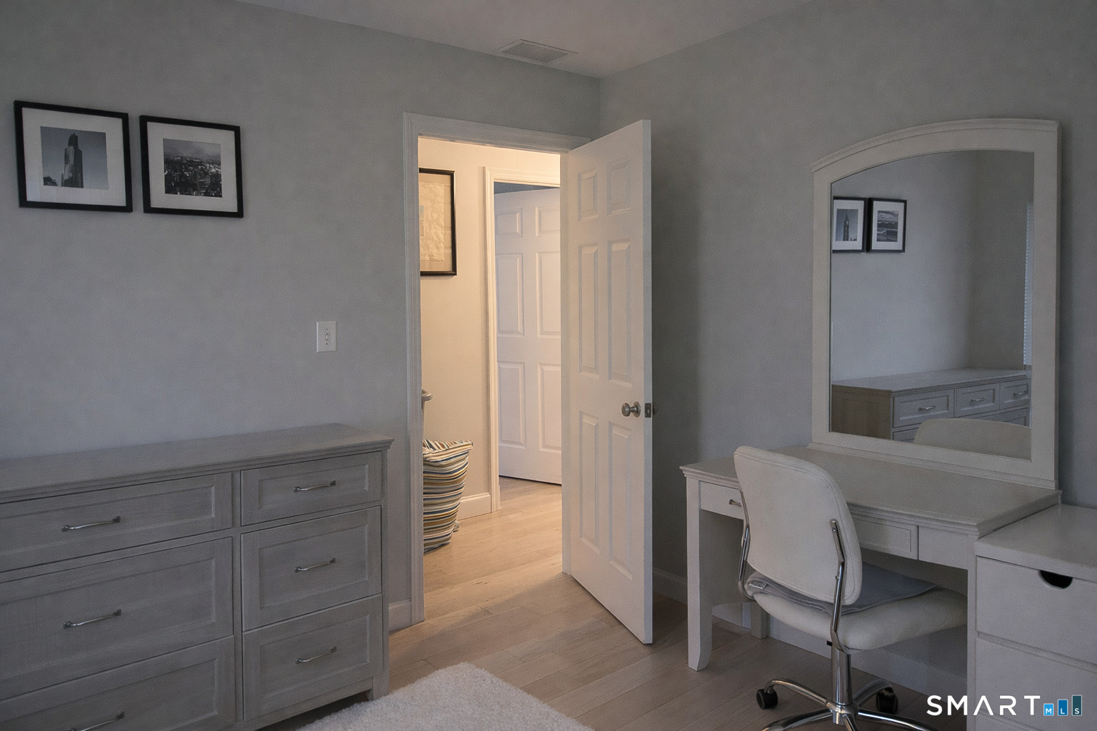 201 Seneca Drive Groton, CT 06340 - Photo 18 of 23 a bathroom with a bathtub and chair