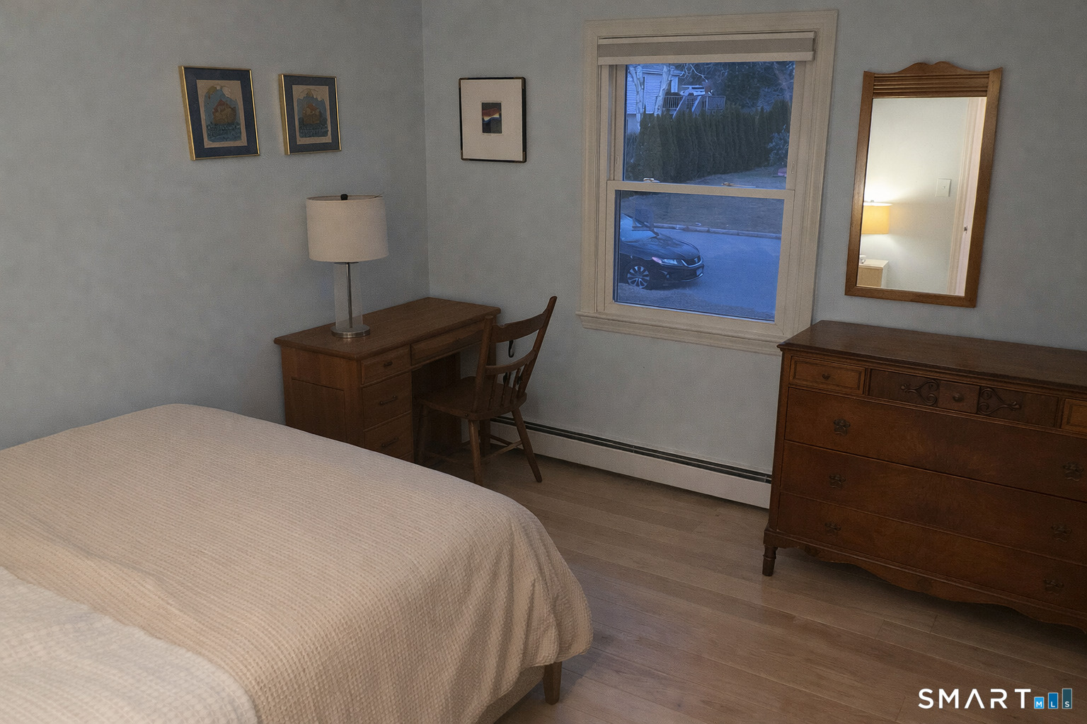 201 Seneca Drive Groton, CT 06340 - Photo 20 of 23 a bedroom with a bed and a table