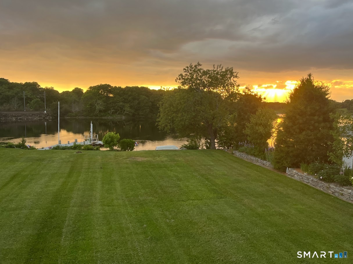201 Seneca Drive Groton, CT 06340 - Photo 2 of 23 a view of lake with green space