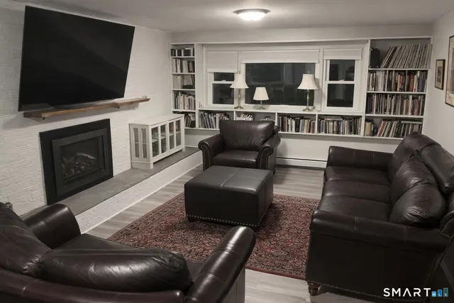 a view of a chairs on the roof deck