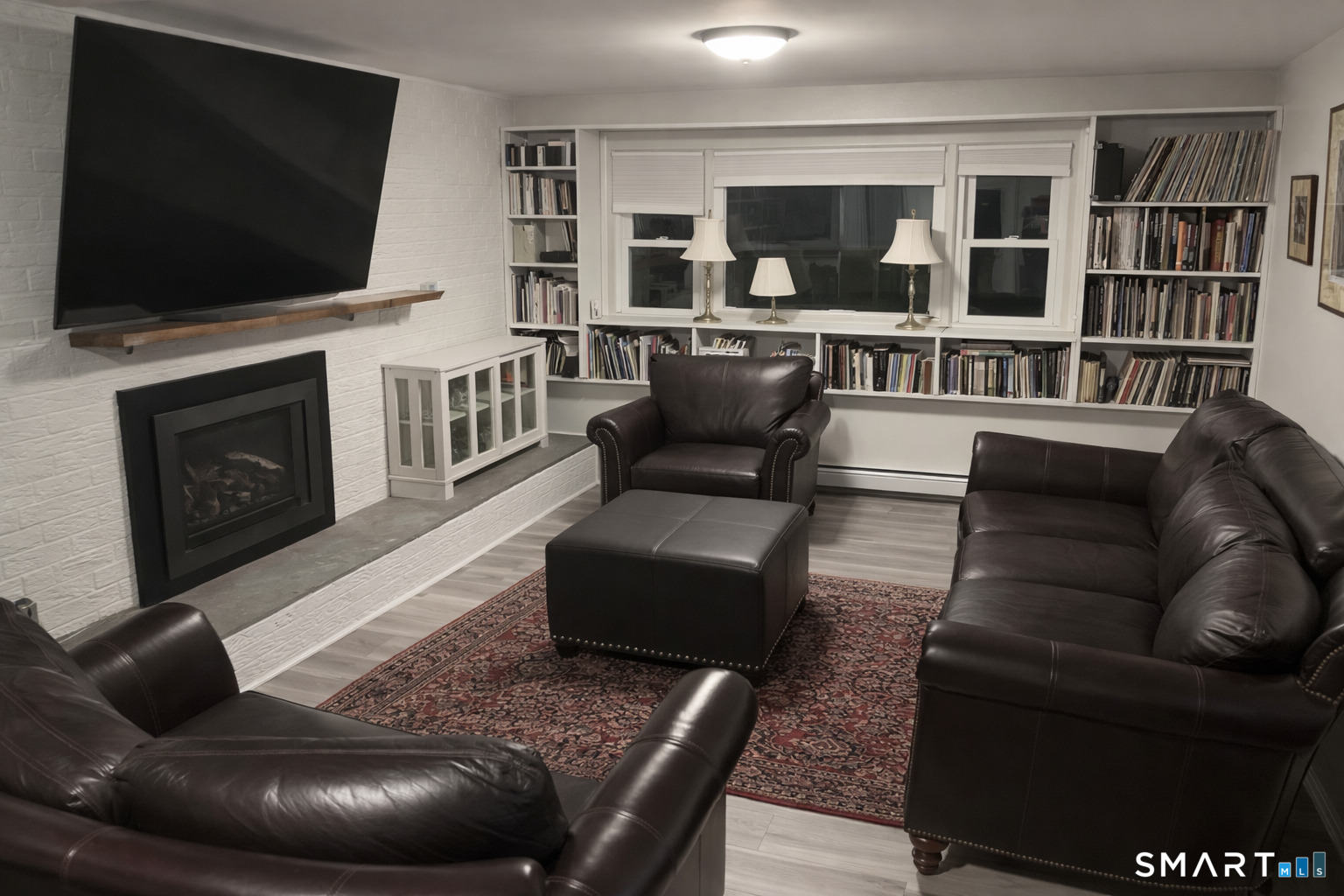 201 Seneca Drive Groton, CT 06340 - Photo 22 of 23 a living room with furniture and a flat screen tv
