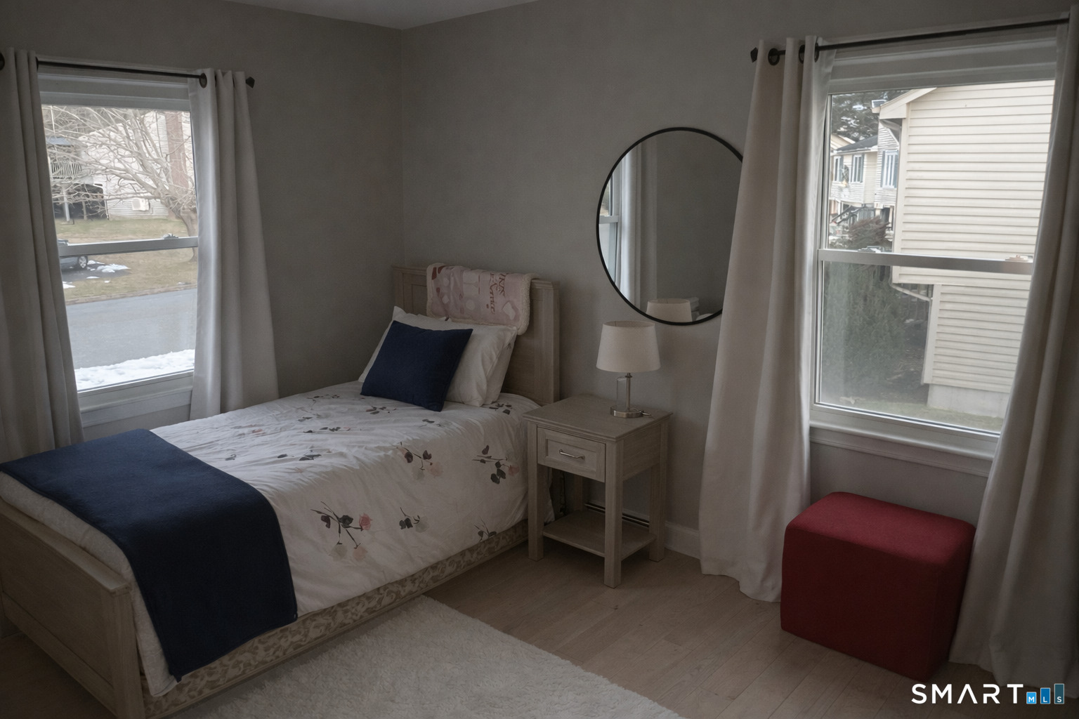 201 Seneca Drive Groton, CT 06340 - Photo 5 of 23 a bedroom with a bed and a mirror